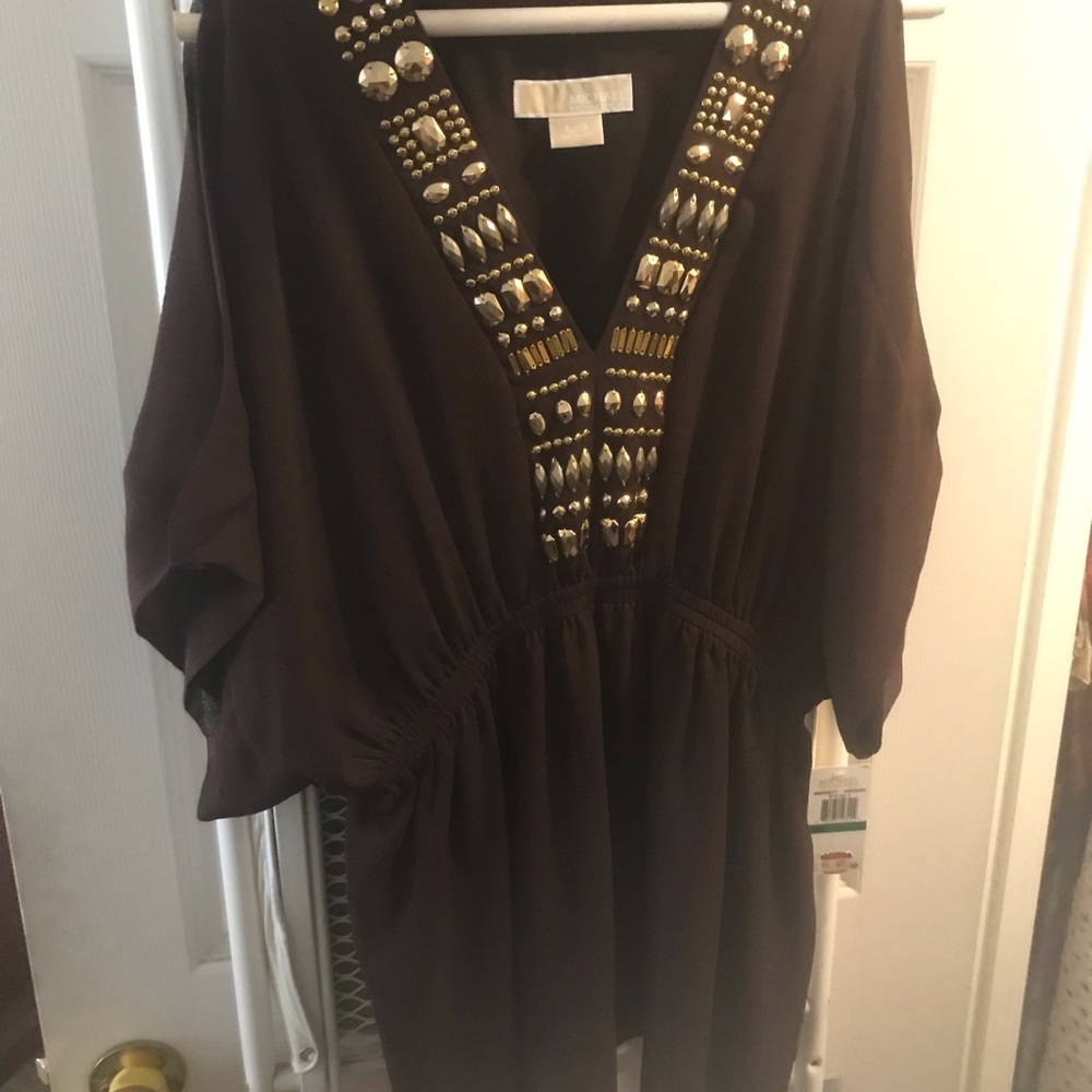 Michael Kors top with stretch waist, sleeve slits, and rhinestone embellishment